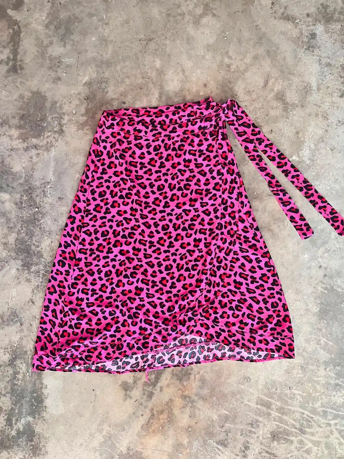 Pollera envolvente animal print fucsia - Talle S/M