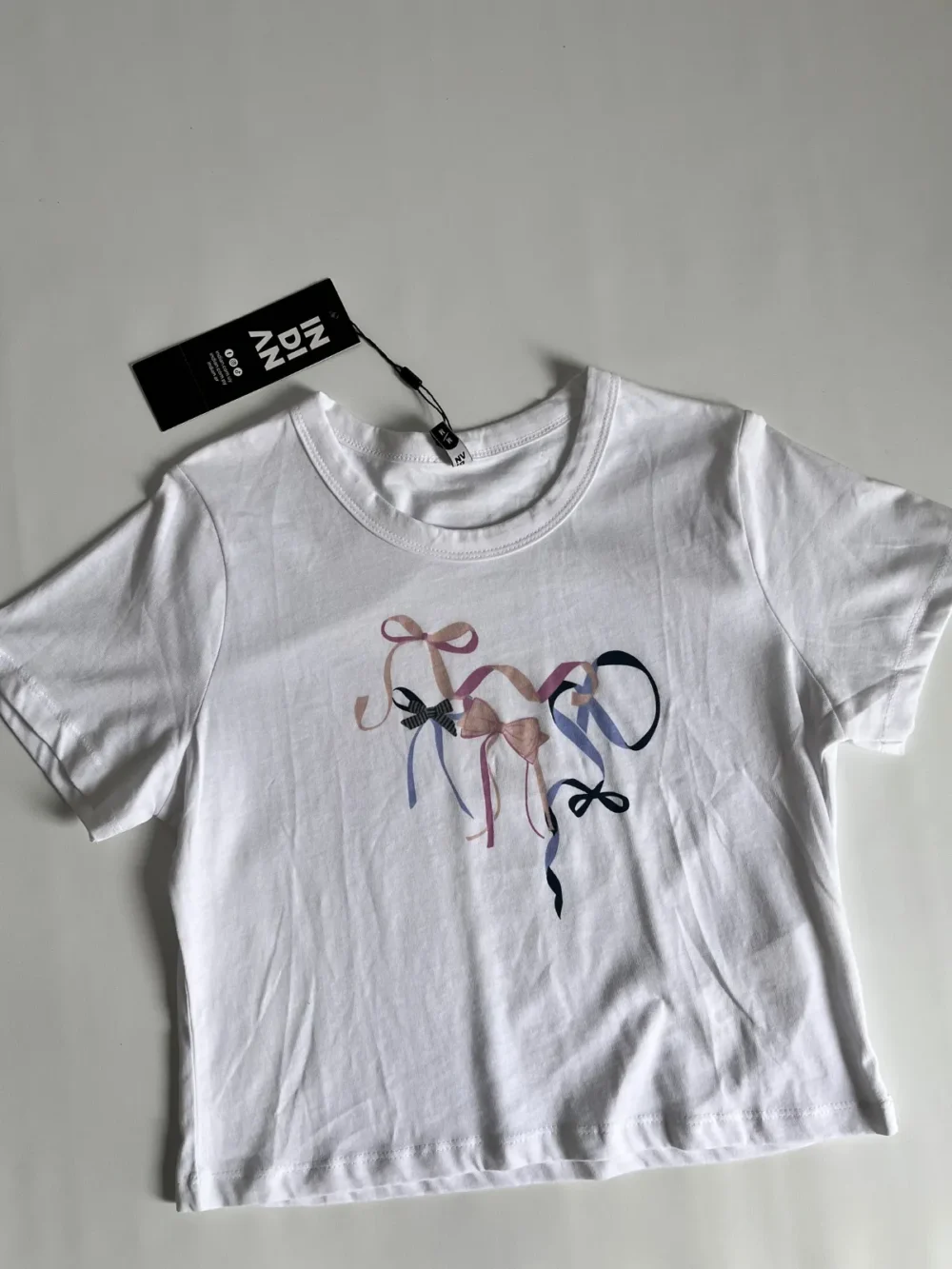 Remera con moño - Talle XL